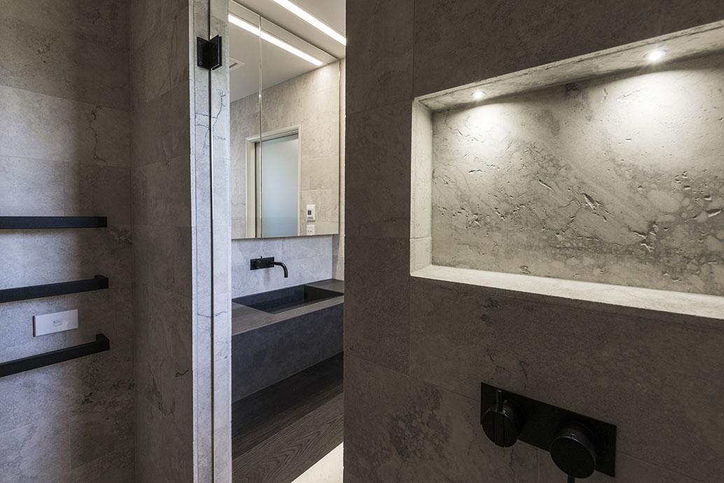 Winner NKBA Bathroom Design of the Year Gold, Winner Best Use of Small Space Bathroom, Winner Regional Bathroom Award Central and Top of the South Island, natural stone, Natural stone travertine, Gusto Dark